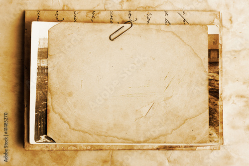 Vintage background with old paper, letters and photos