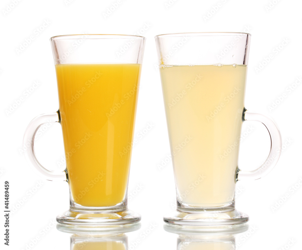 Tropical juices in glasses isolated on white Tropical juices in glasses isolated on white