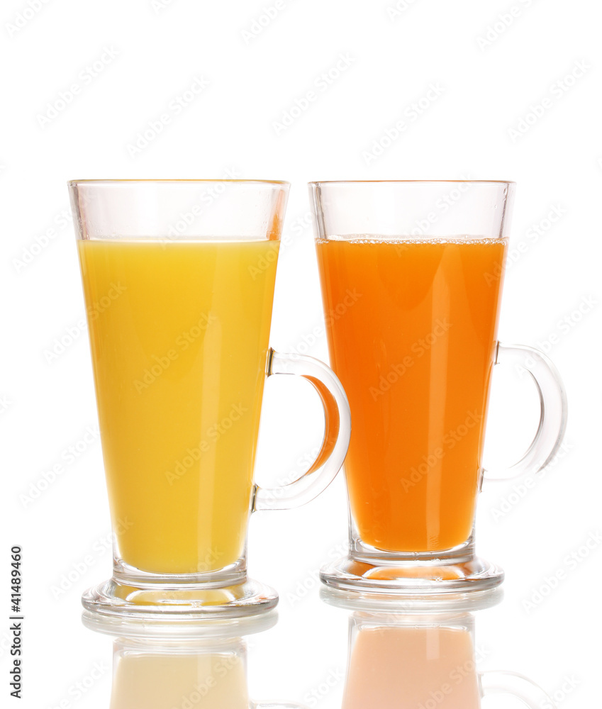 Tropical juices in glasses isolated on white Tropical juices in glasses isolated on white