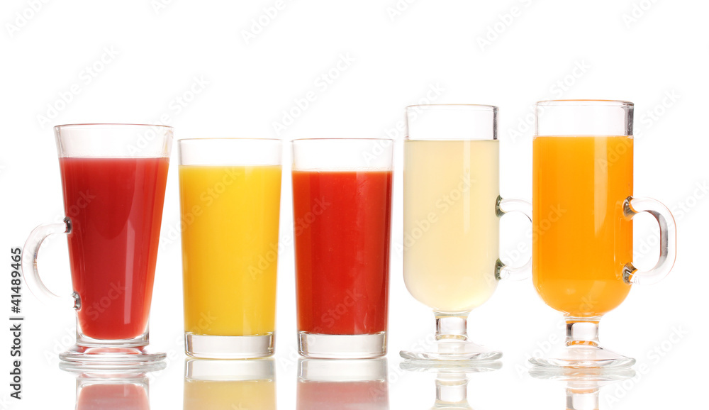 Tropical juices in glasses isolated on white Tropical juices in glasses isolated on white