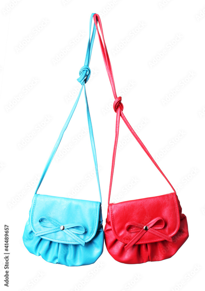 Two small colorful handbags isolated on white