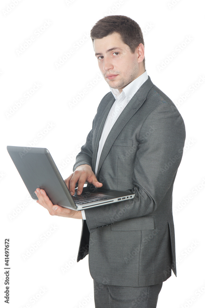 Portrait of young success businessman with laptop Portrait of young success businessman with laptop