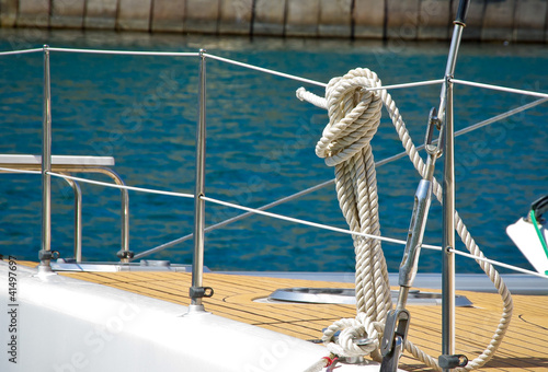 Ropes and knots of sailboat. Tackles on the rigging yacht.
