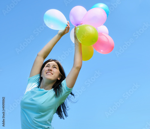 happy girl with balloons © bit24