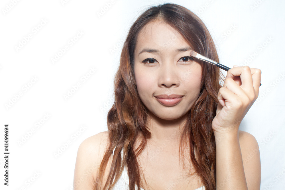 Applying make up Applying make up