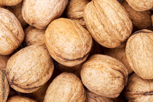 Brown walnuts textured background