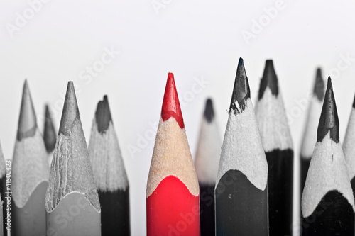 Red Pen standing out, over white background