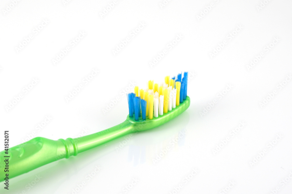 Tooth-brush with green handle over white Tooth-brush with green handle over white
