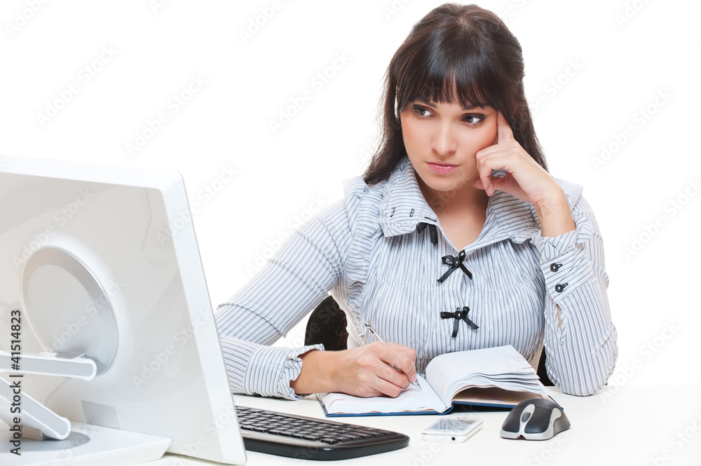 studio picture of thoughtful secretary writing something studio picture of thoughtful secretary writing something