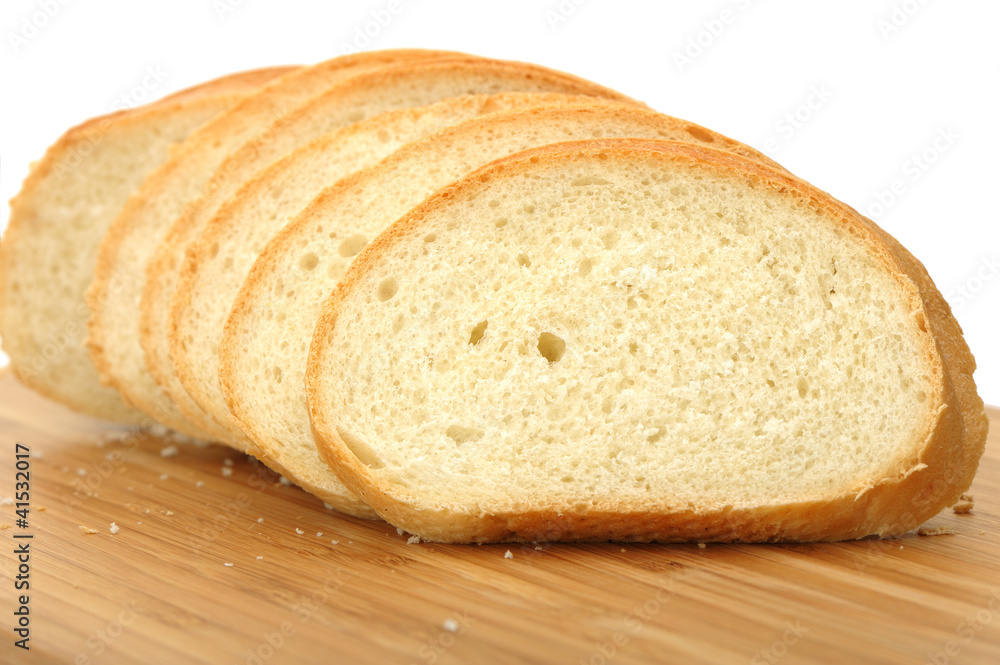 The cut bread on a chopping board