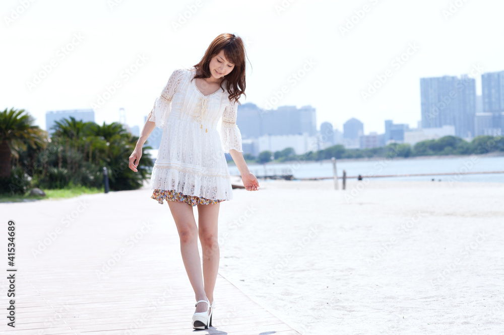 Beautiful young woman on beach summer holiday. Portrait of asian Beautiful young woman on beach summer holiday. Portrait of asian