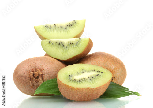 Juicy kiwi fruits with leaves isolated on white.