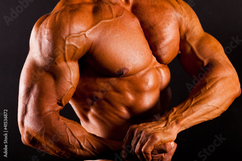 muscular man top body studio shot photo