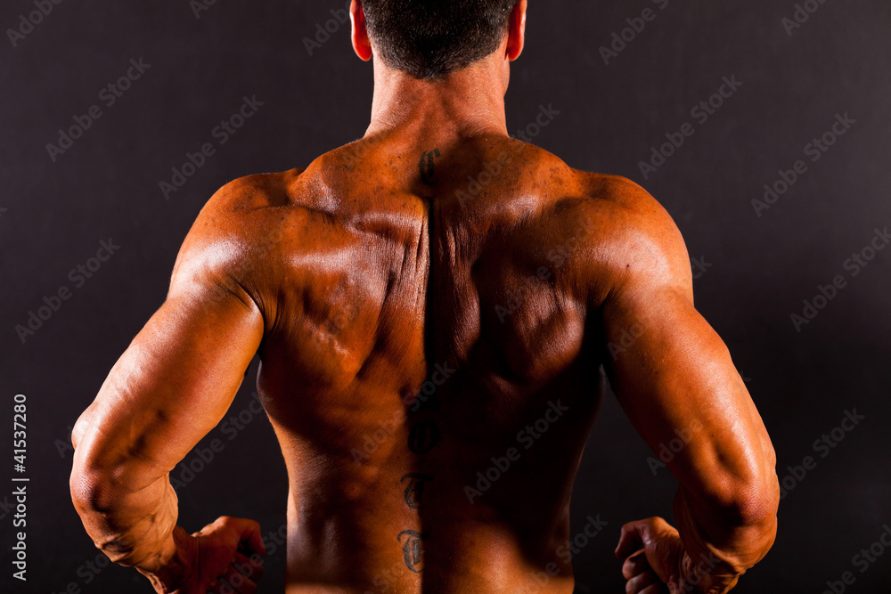 © michaeljung - rear view of a bodybuilder's back © michaeljung - rear view of a bodybuilder's back