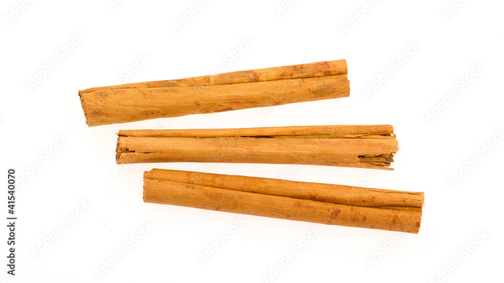 Three cinnamon sticks isolated on white background