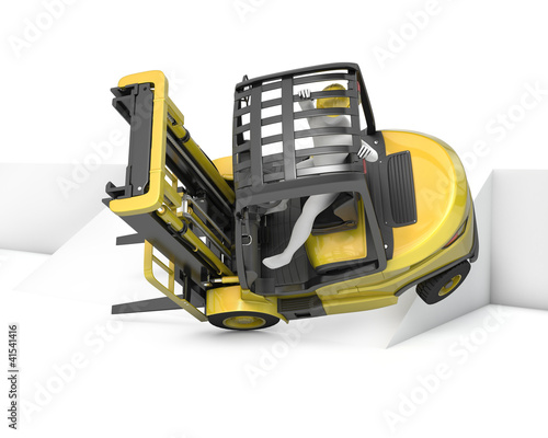 Yellow fork lift truck falling after turning on slope