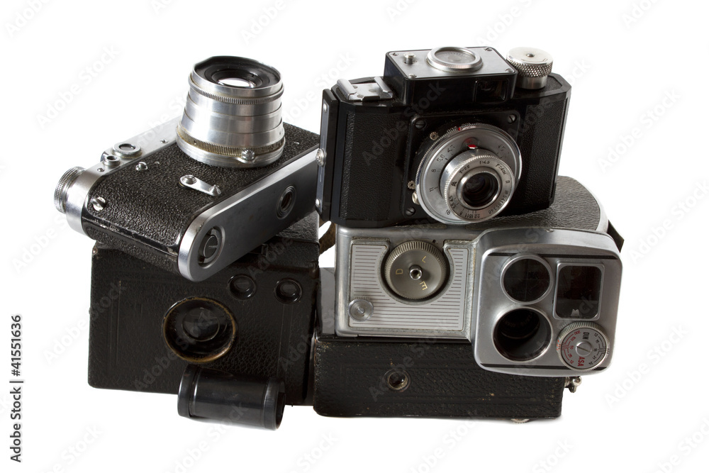 old  photocamera, videocamera and photoaccessories isolated on