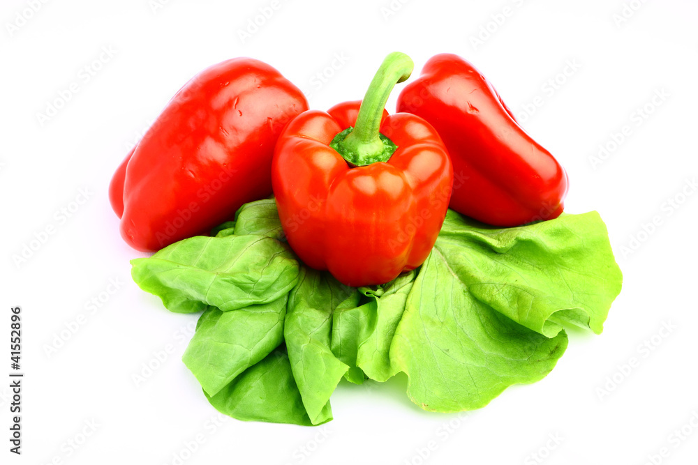Delicious tasty red paprika with fresh lettuce Delicious tasty red paprika with fresh lettuce