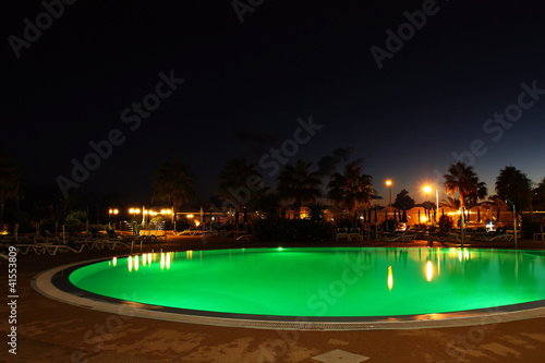 Green pool at night