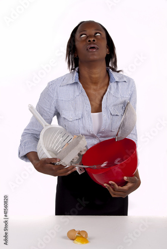 South African woman struggling in kitchen