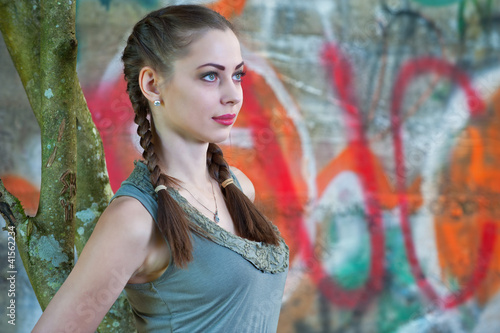 A young woman in an urban surrounding