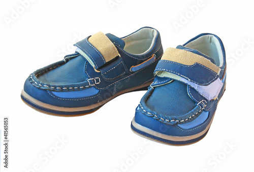 Pair child little fashionable blue boot on a white background