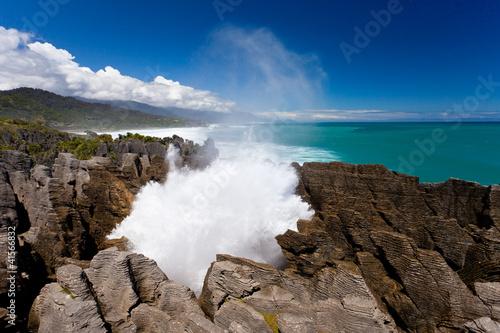 Obraz na plátně Surf in blowhole Pancake Rocks of Punakaiki, NZ