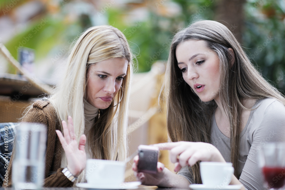 cute smiling women drinking a coffee cute smiling women drinking a coffee