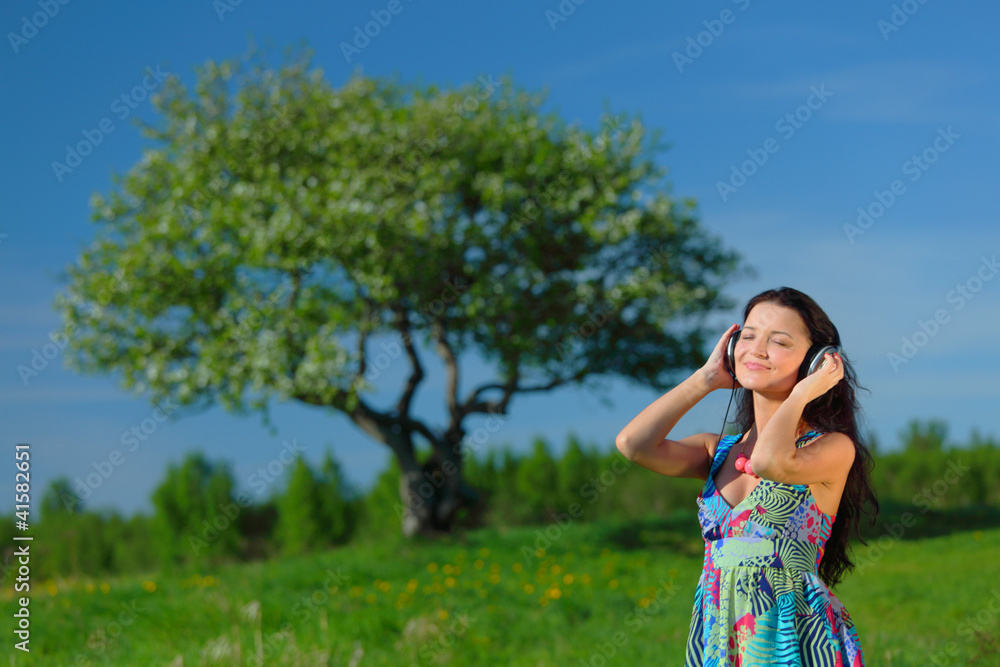 Young woman enjoying music