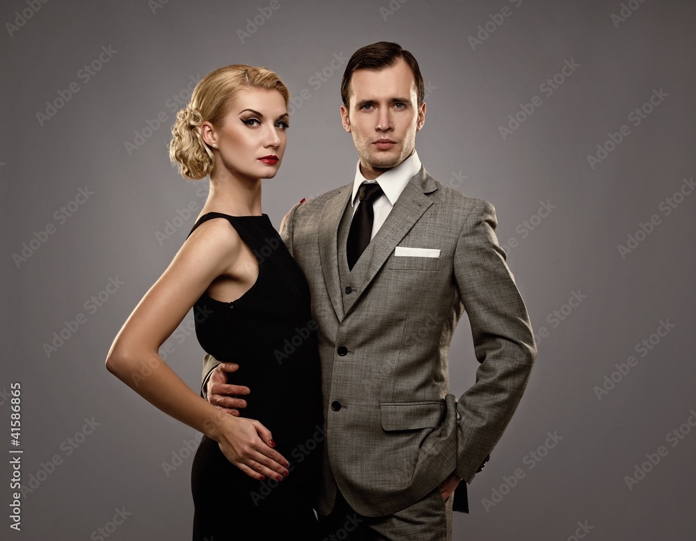 Retro couple on grey background. Retro couple on grey background.