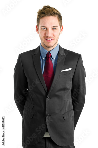 Handsome young businessman portrait isolated on white