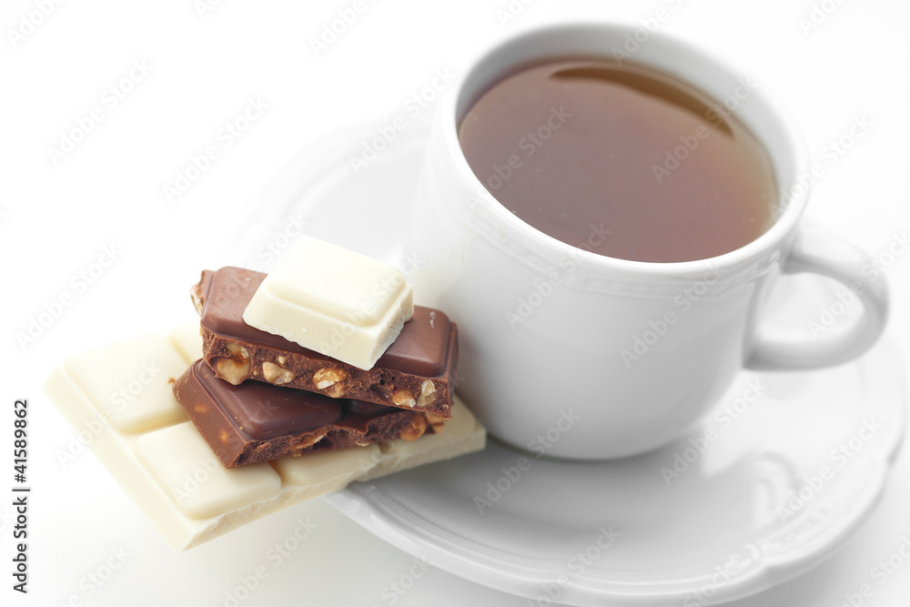 bar of chocolate and tea isolated on white