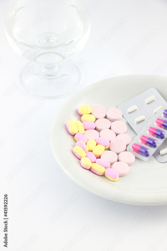 Part of medicine tablet dish on table. Part of medicine tablet dish on table.