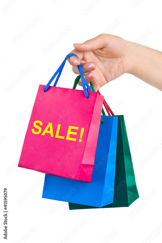 Hand with shopping bags Sale