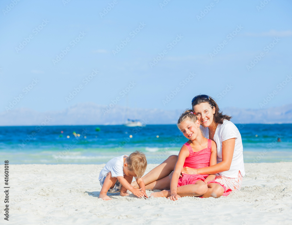 Happy family on tropical beach Happy family on tropical beach