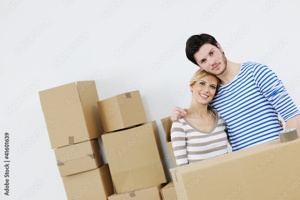 Young couple moving in new house Young couple moving in new house