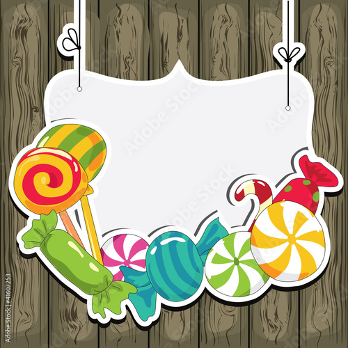 Sweets on wooden background photo