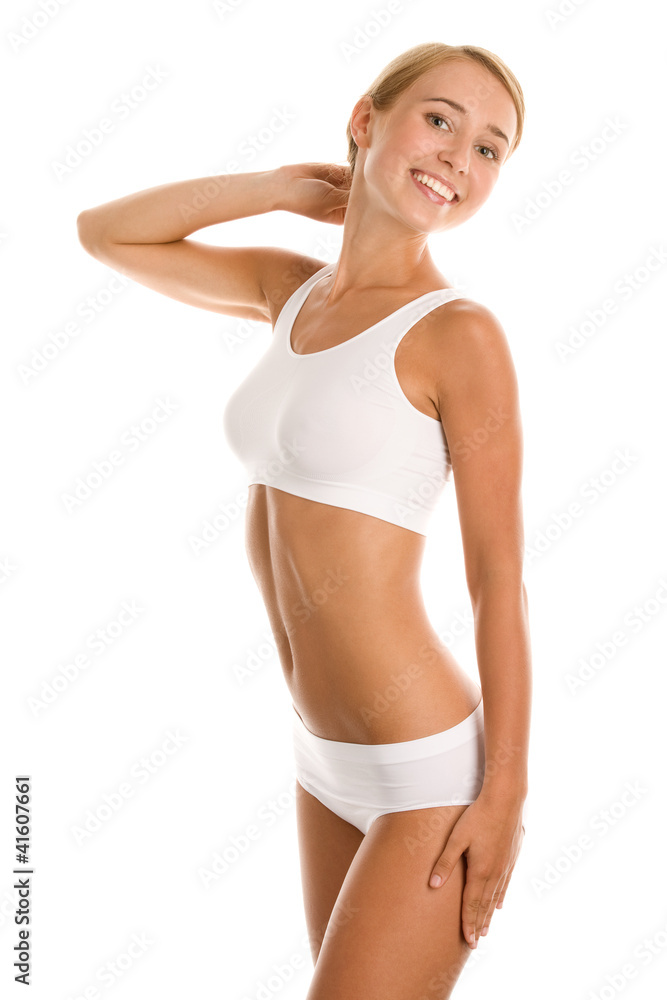 Fototapeta premium Young woman standing on white background