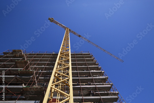 construction site with tower crane - cantiere, gru, cielo blu