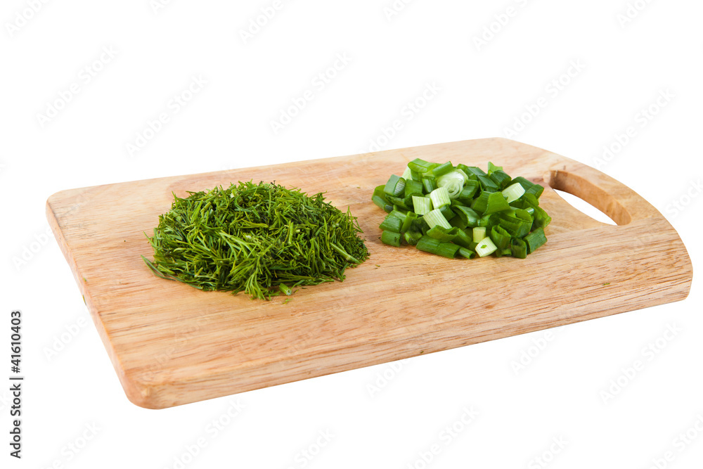 Onion and parsley on the cutting board Onion and parsley on the cutting board