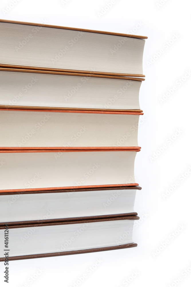 A stack of books on a white background. A stack of books on a white background.