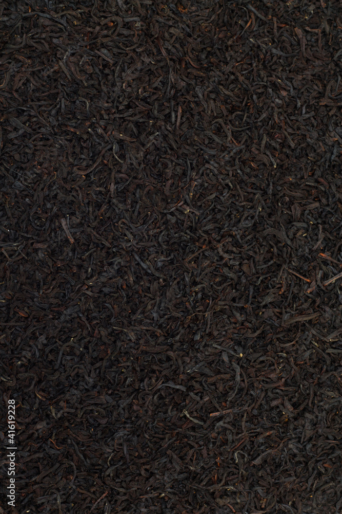 Black tea leaves background. Abstract food textures. Black tea leaves background. Abstract food textures.