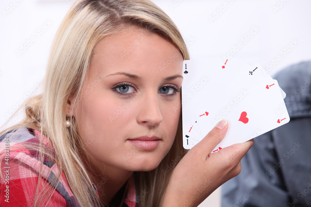 Girl showing poker cards