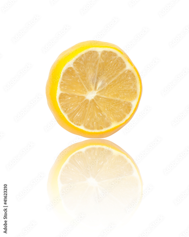 Half of ripe lemon. Isolated on white