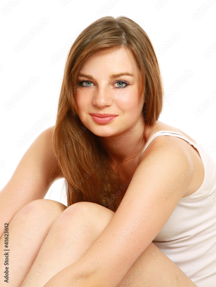Attractive young woman in white underwear sitting on floor Attractive young woman in white underwear sitting on floor
