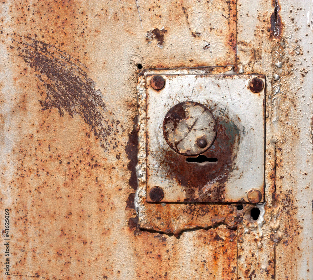 Old padlock on garage collars