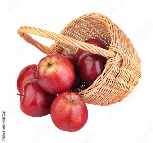 basket of red apples on white background