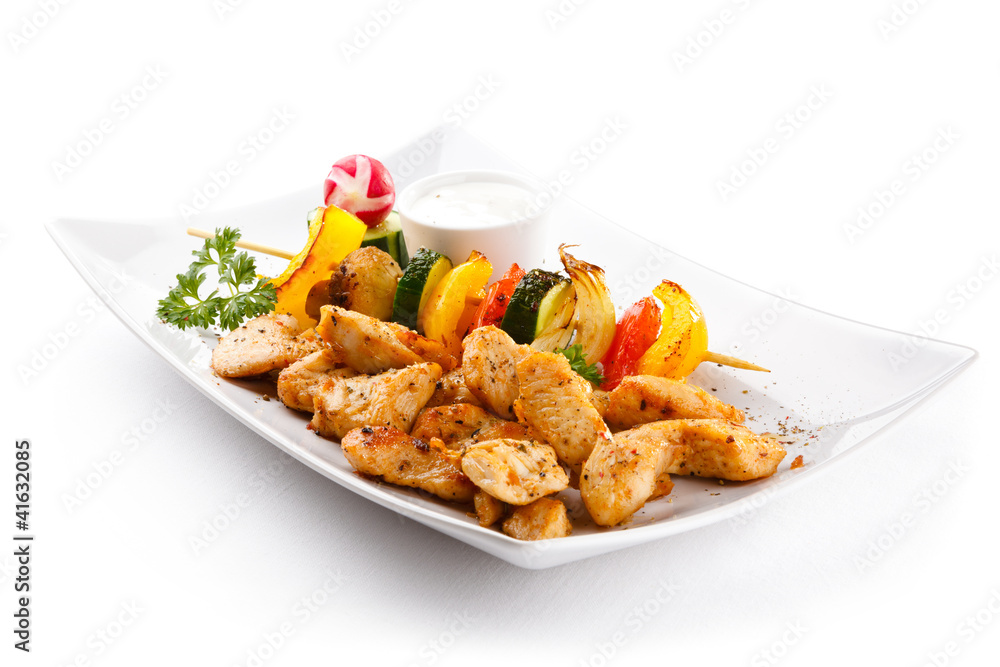 Grilled meat and vegetables on white background Grilled meat and vegetables on white background