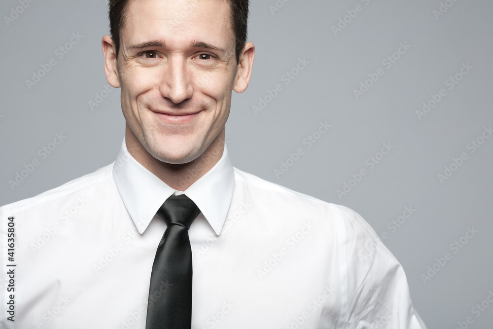 Businessman in white shirt expressing positivity. Businessman in white shirt expressing positivity.