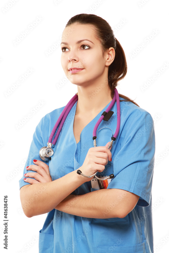 Happy young nurse standing with folded arms Happy young nurse standing with folded arms